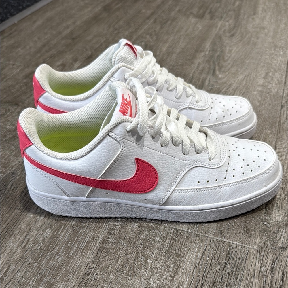 Nike White and Pink Sneakers with Classic Design